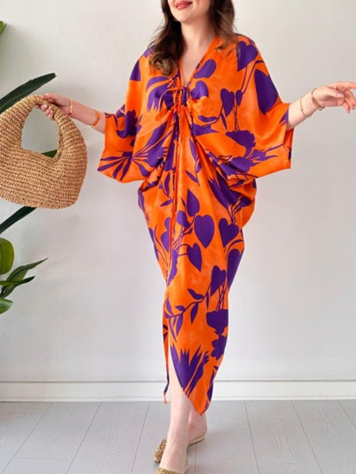 ARAVESSA – PRINTED BAT SLEEVE V-NECK DRESS