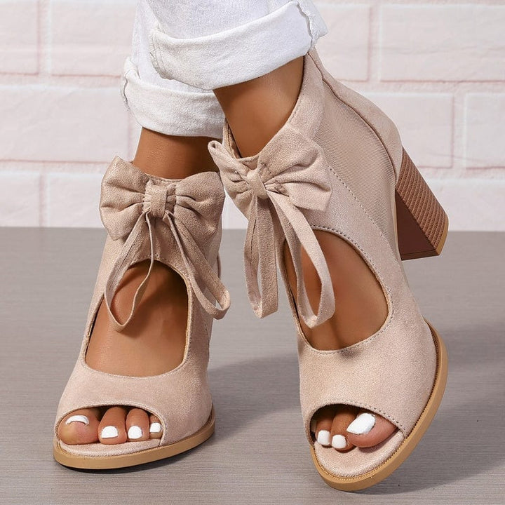 EVELYNRA – LUNETTE BOW HEELS